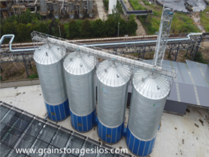 Soybeans enter different silos through bucket elevator.